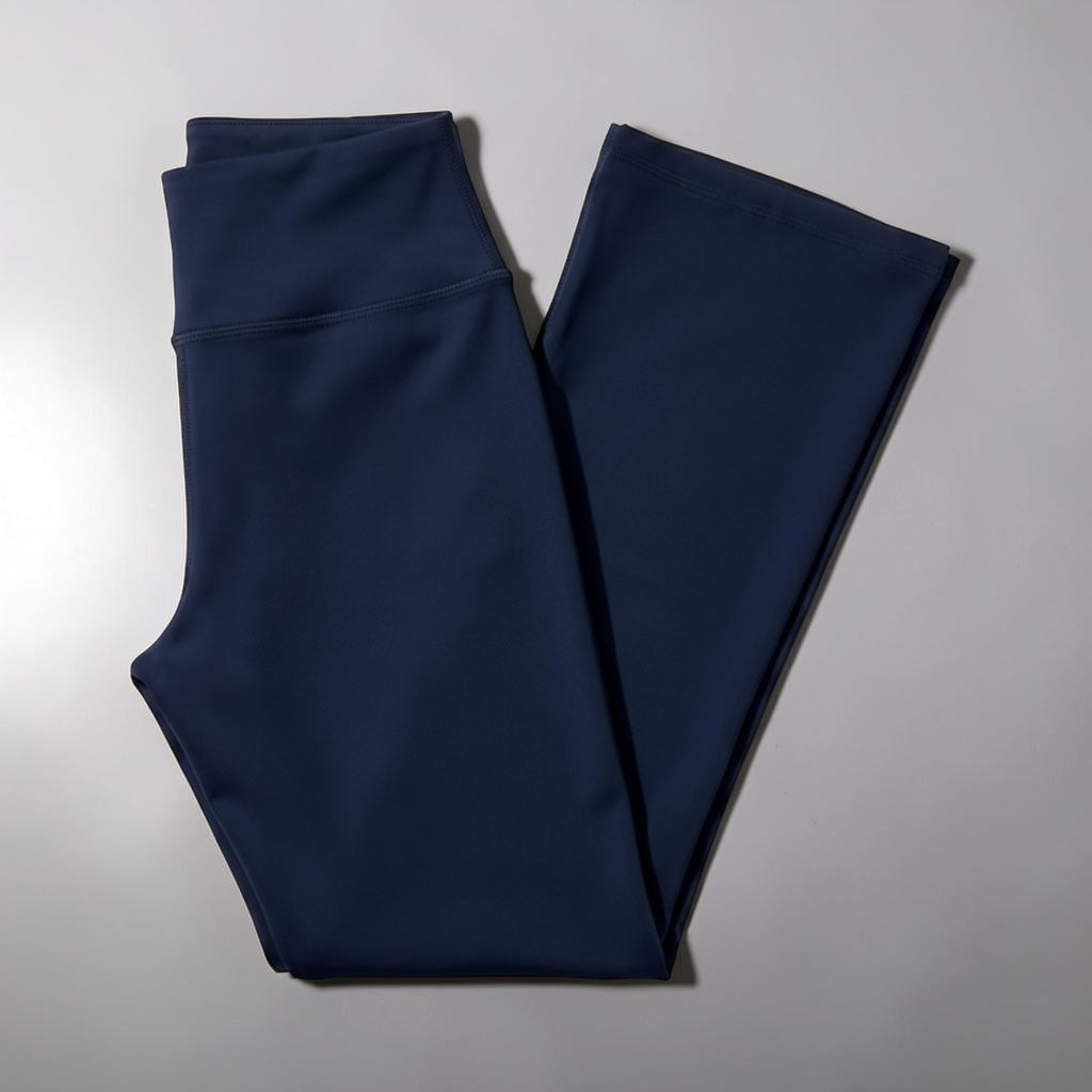Navy Blue girls’ flare pants folded to show the fabric